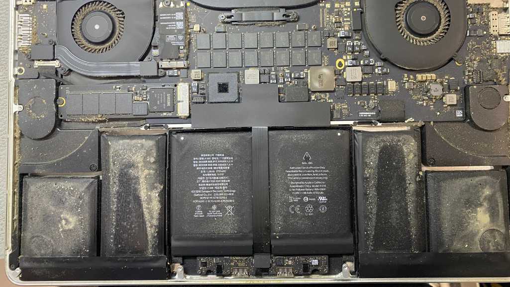Faulty Macbook Battery due to Water Spillage