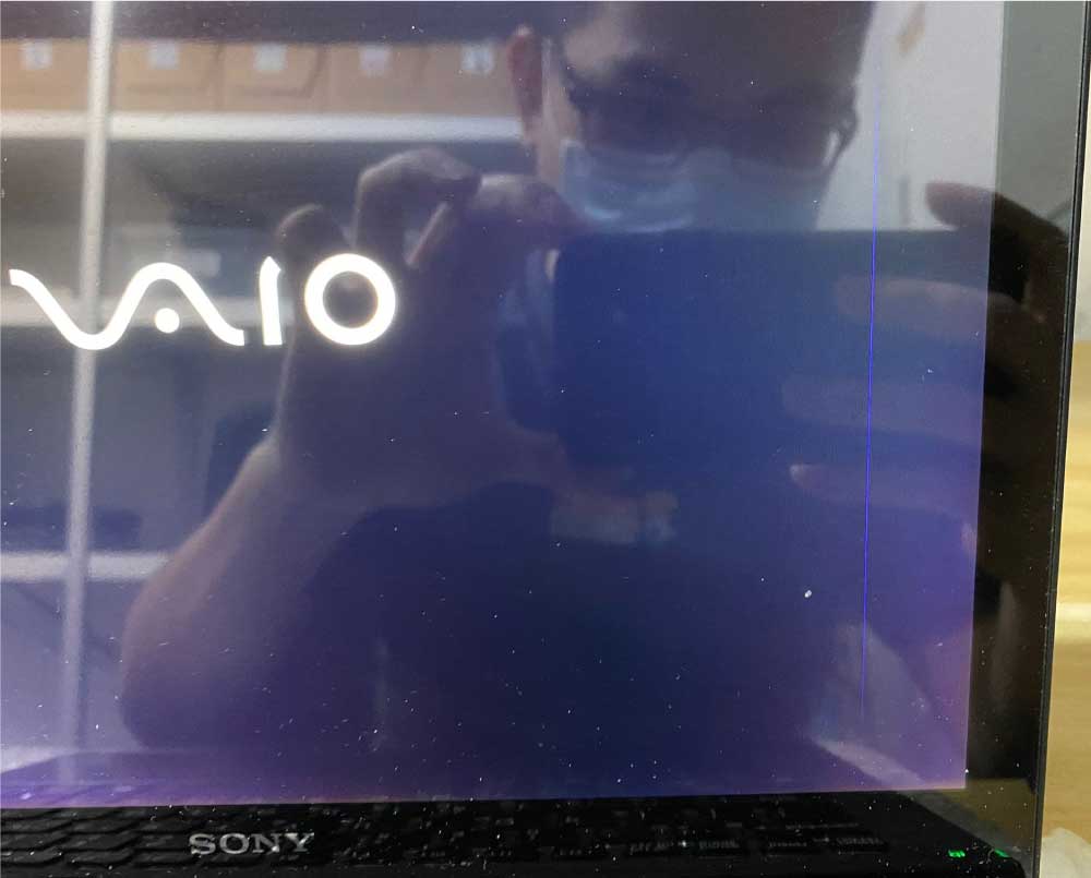 Sony laptop screen with blue line and bleeding